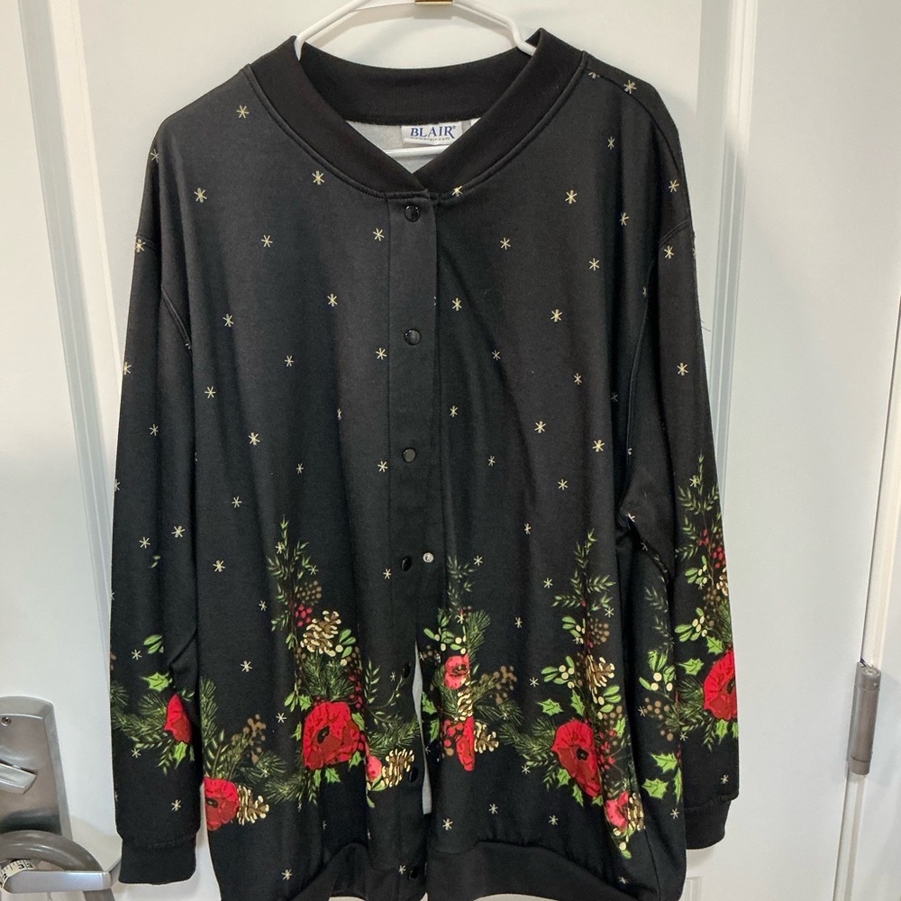 2X jacket, black with colorful design at hem.